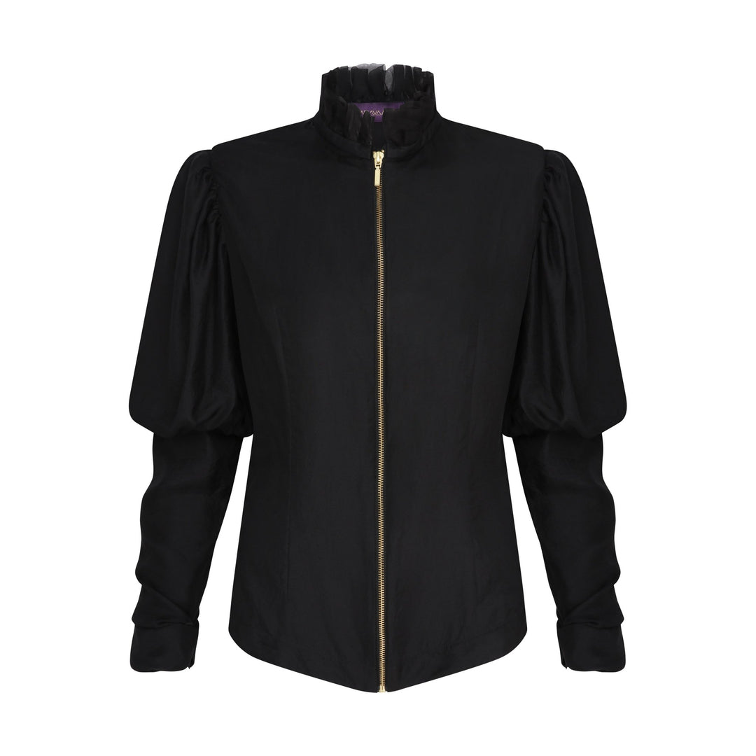 The Black Puff Ruffle Blouse in black silk twill, flat lay front with zip, studio