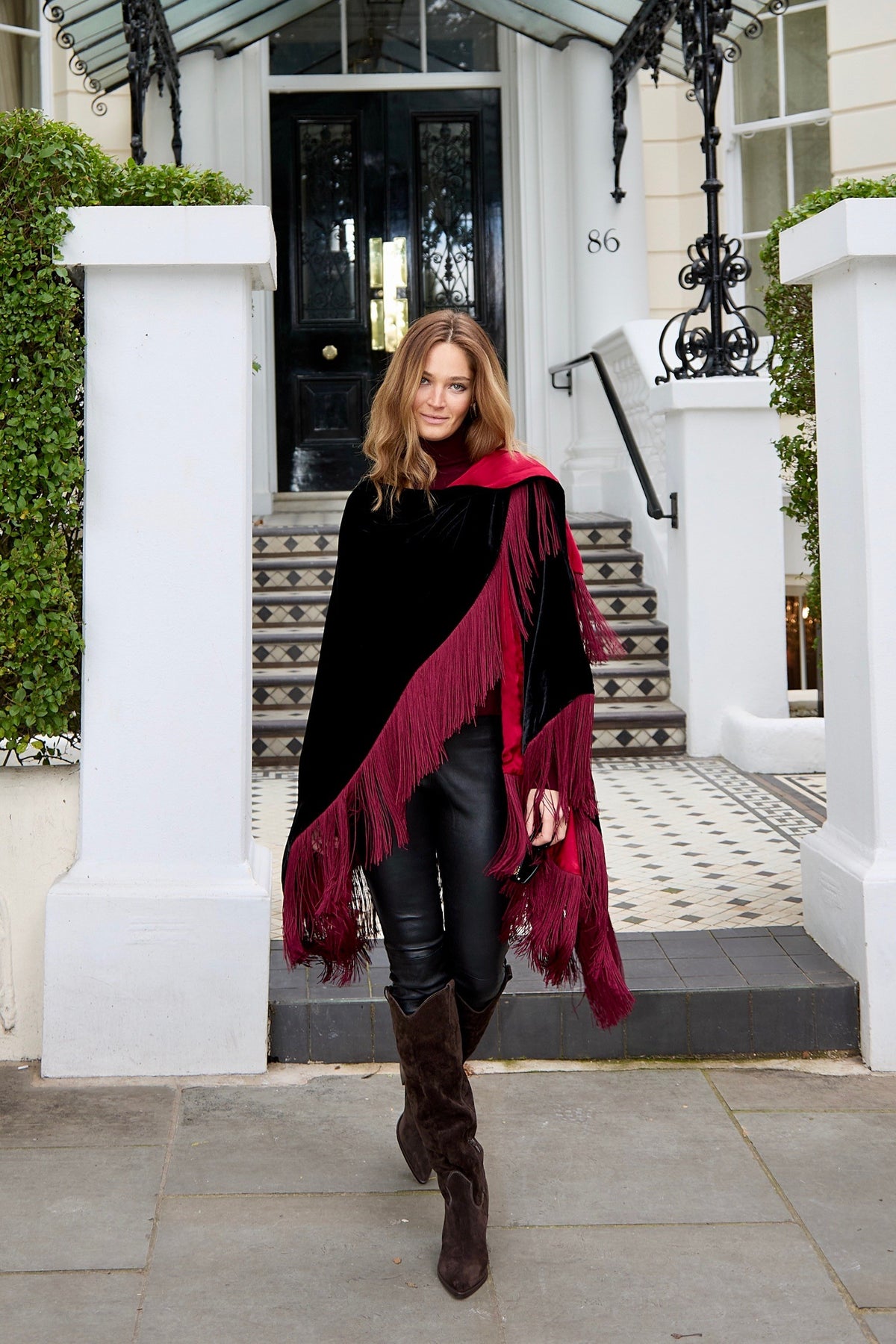 The Black Rose Poncho in silk velvet, worn, London street