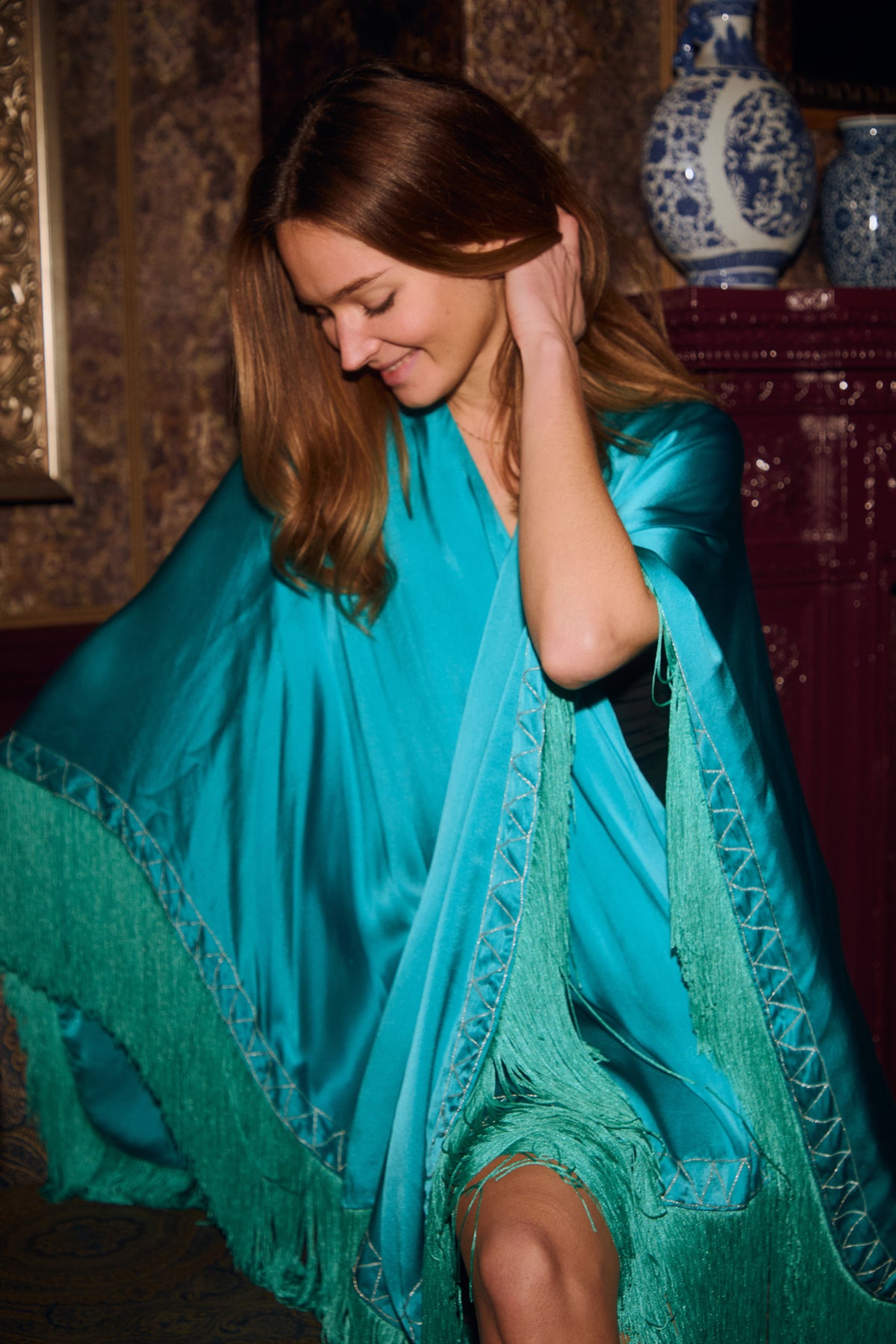 The Blue Poppy Poncho in turquoise silk, worn, interior
