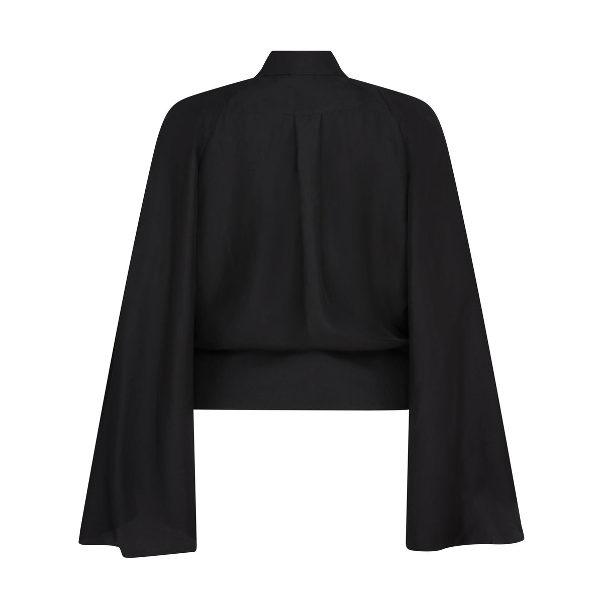 The Cape Sleeve Blouse in black silk twill, flat lay back, studio