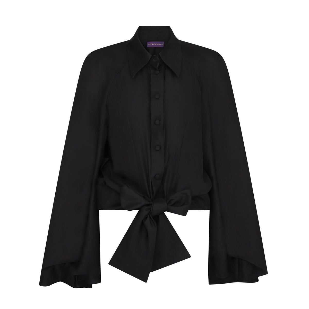 The Cape Sleeve Blouse in black silk twill, flat lay front with bow, studio