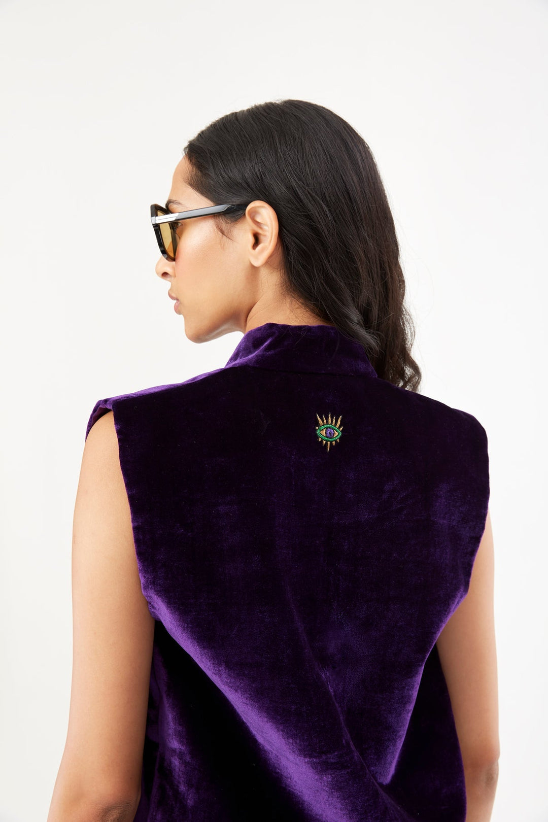 The 'Eye to Eye' Vest in deep purple silk velvet with eye embroidery, back detail, studio