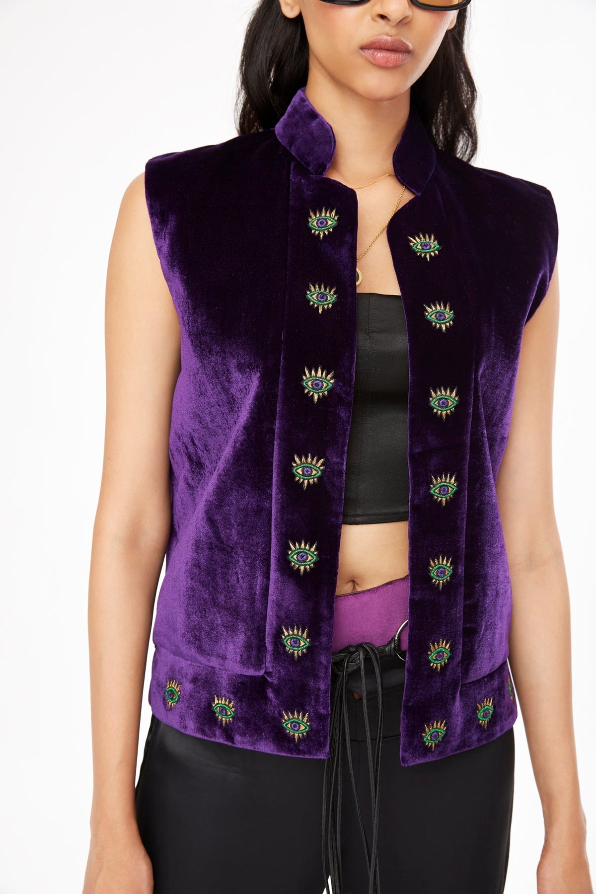 The 'Eye to Eye' Vest in deep purple silk velvet with eye embroidery, close-up front, studio