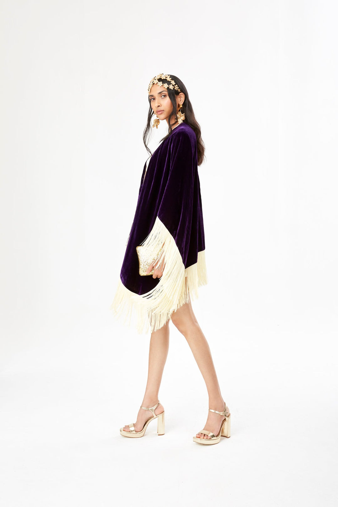 The Gatsby Poncho in purple silk velvet with champagne fringe, side view, studio