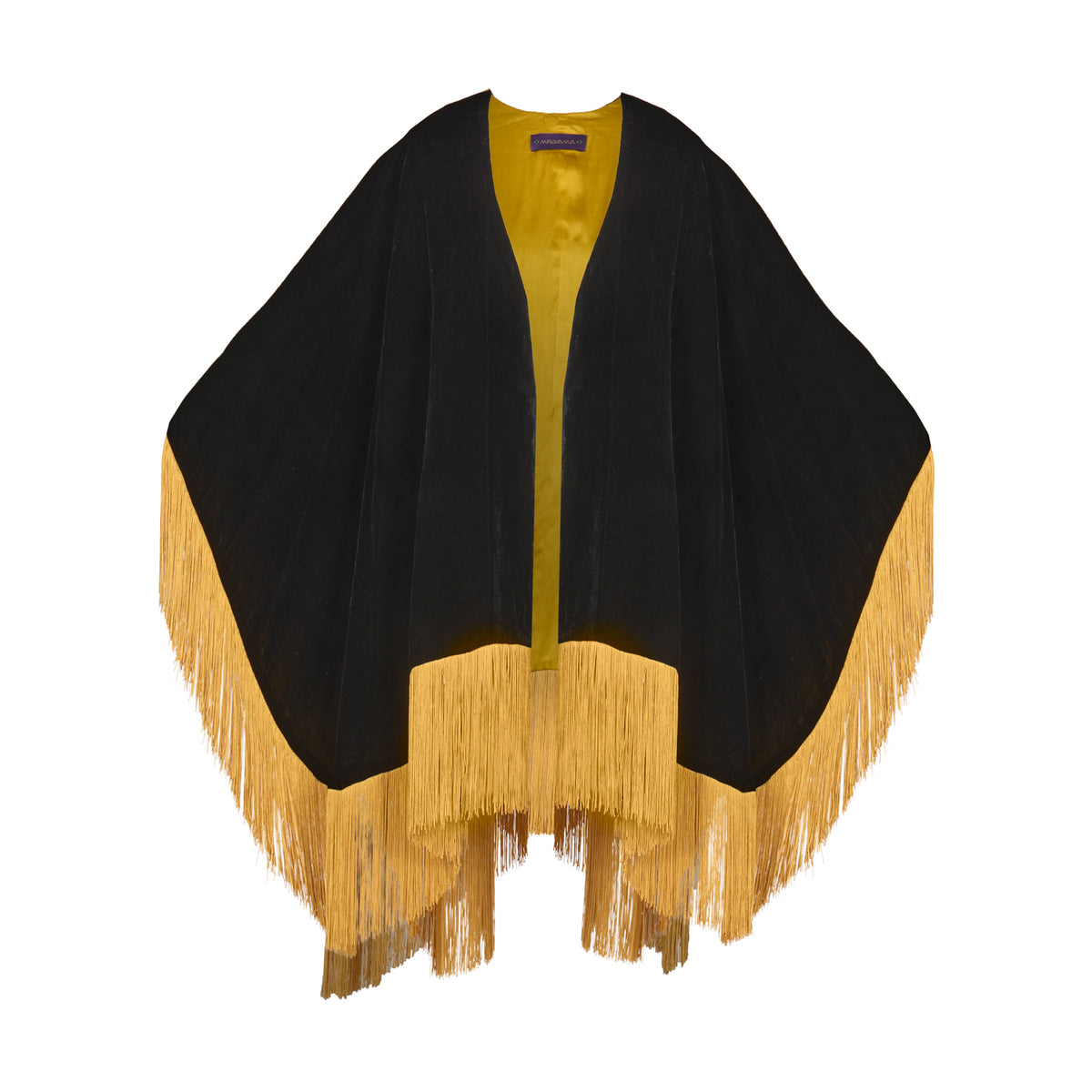 The Golden Age Poncho in black silk velvet with gold fringe, flat lay, studio