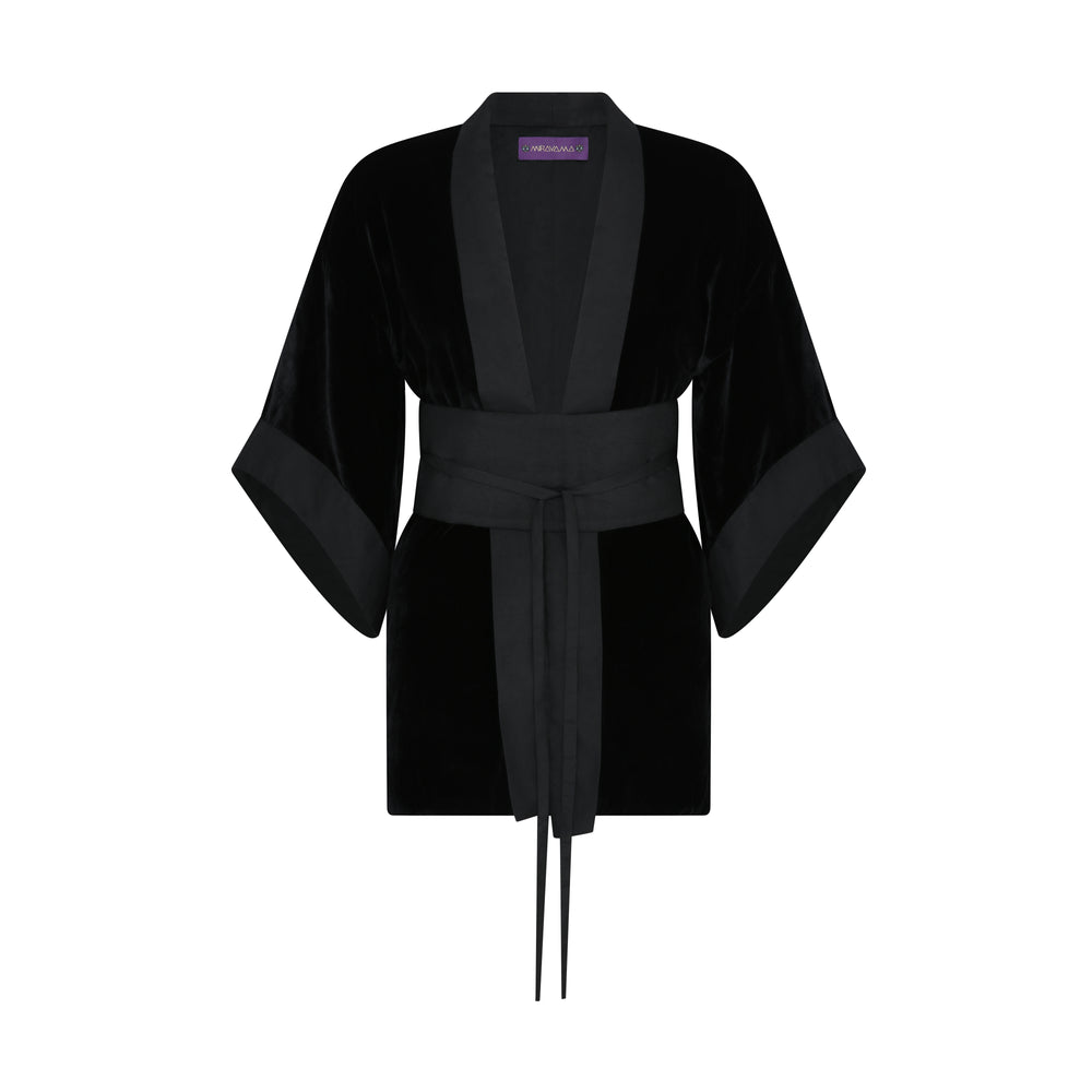 The Little Black Kimono in black silk velvet with organza trim and belt, flat lay front, studio
