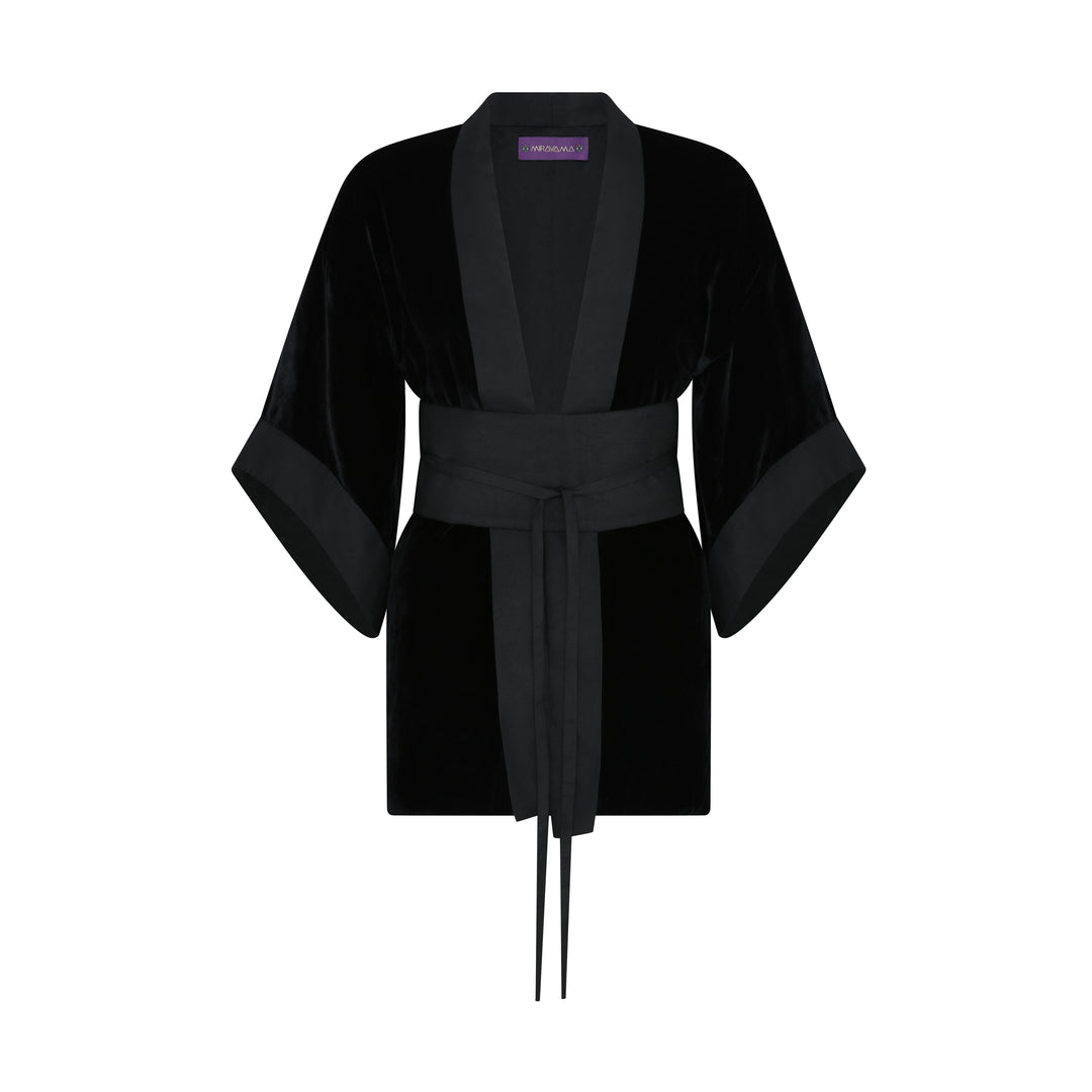 The Little Black Kimono in black silk velvet with organza trim and belt, flat lay front, studio