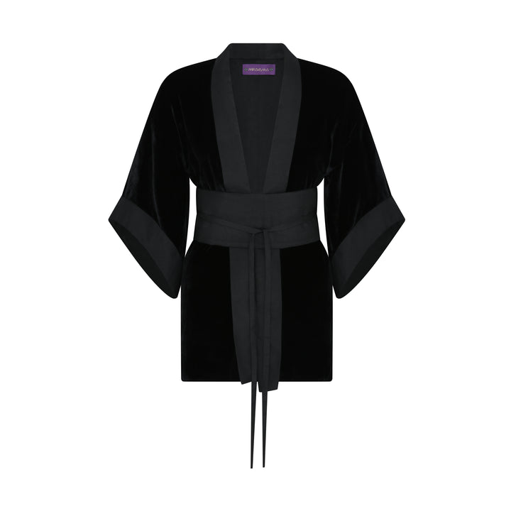 The Little Black Kimono in black silk velvet with organza trim and belt, flat lay front, studio