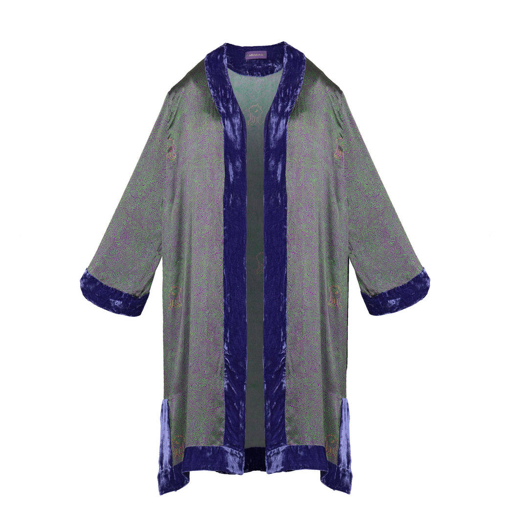 The Mazestroom Kimono, Purple and Green, in iridescent green and purple maze-print silk with velvet trim, flat lay, studio