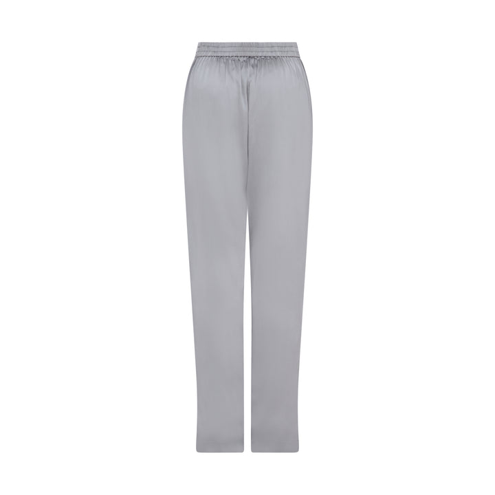 The Silver Grey Trousers in silver grey silk, flat lay back, studio