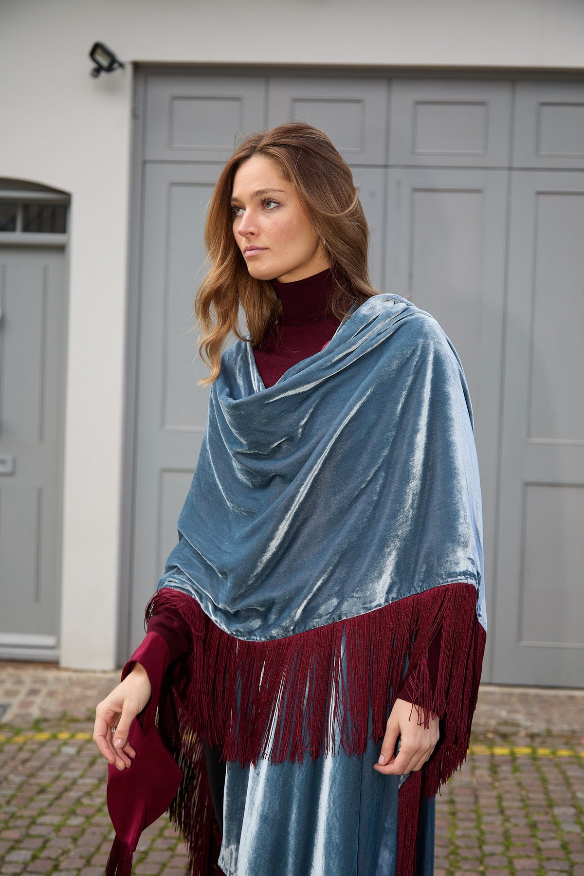 The Summer Cloud Poncho draped as a shawl, front view