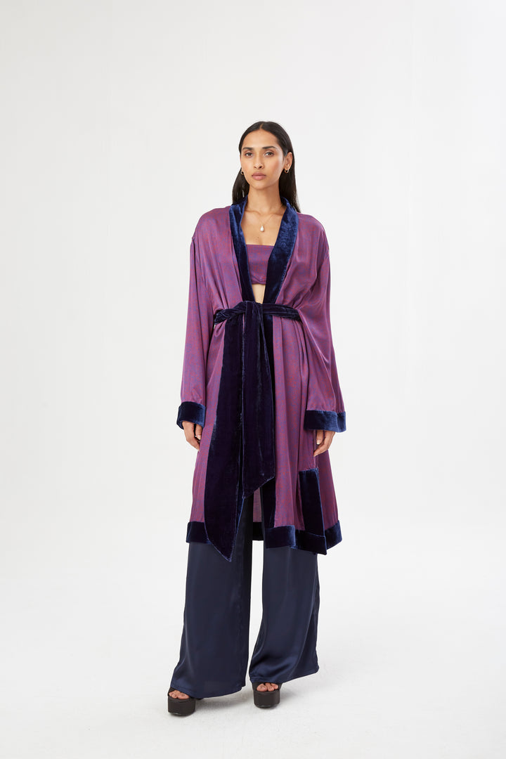 The Mazestroom Kimono, Navy and Red, in red and navy maze-print silk with velvet trim, front view, studio